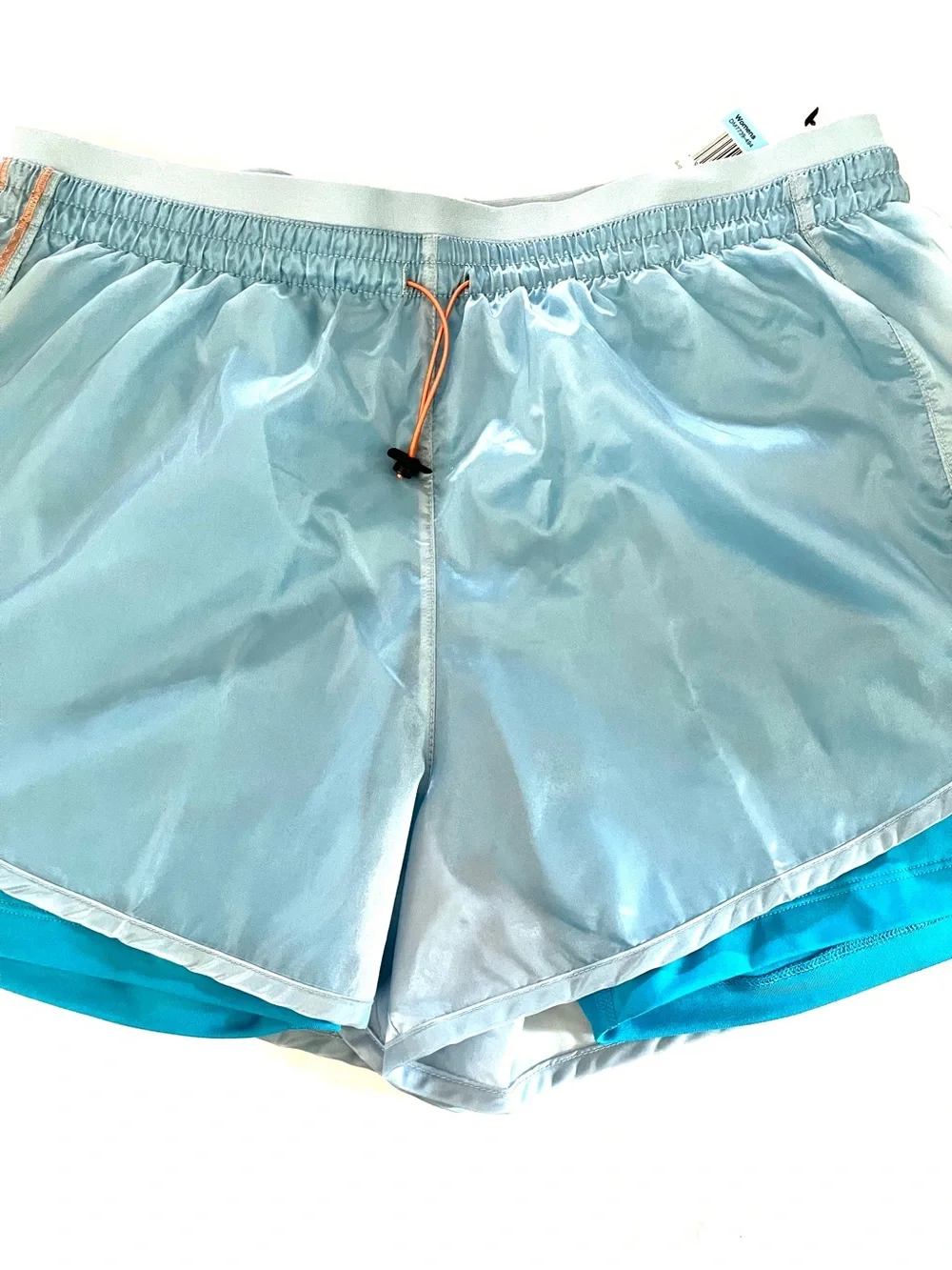Nike Light Blue Women's Athletic Shorts with Orange Drawstring